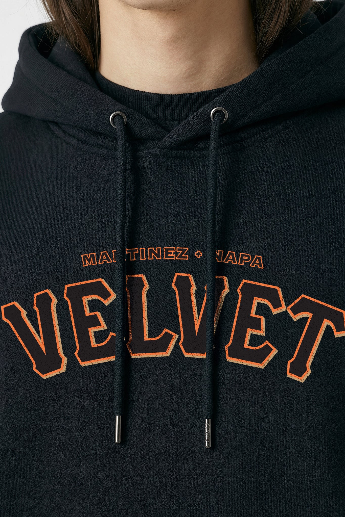 Black hoodie with orange text on a plain background