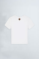 White t-shirt with a logo on the chest against a light background