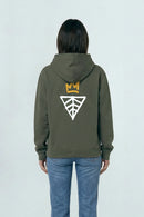 Person wearing a Khaki green hoodie with a logo on the back against a light background