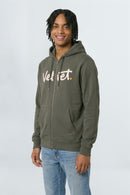 Person wearing a Khaki green hoodie with 'Velvet' text on a light background