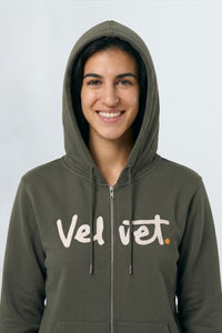 Person wearing a Khaki green hoodie with 'Velvet' text on a plain background