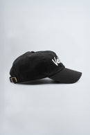 Black cap with 'Velevt' logo on a light gray background