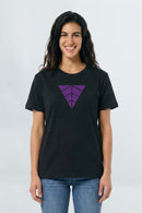 Woman wearing a black t-shirt with a purple geometric design on a light background