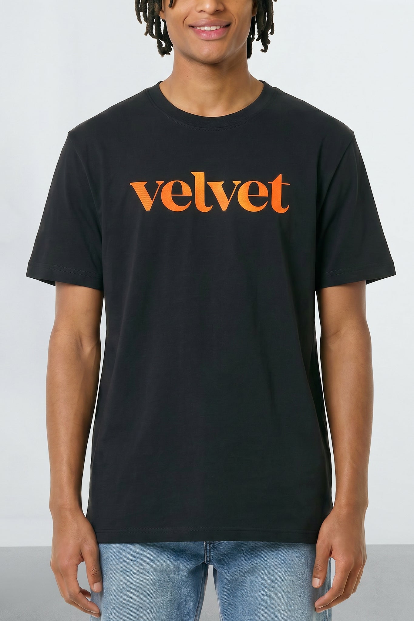 Orange  'velvet' text on a plain background