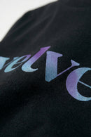 Black fabric with 'velvet' text in gradient colors on a light background