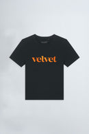 Black t-shirt with 'velvet' text in orange on a light background