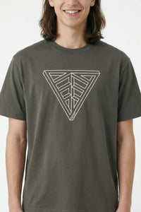 Person wearing a Khaki green t-shirt with a geometric triangle design on a light background