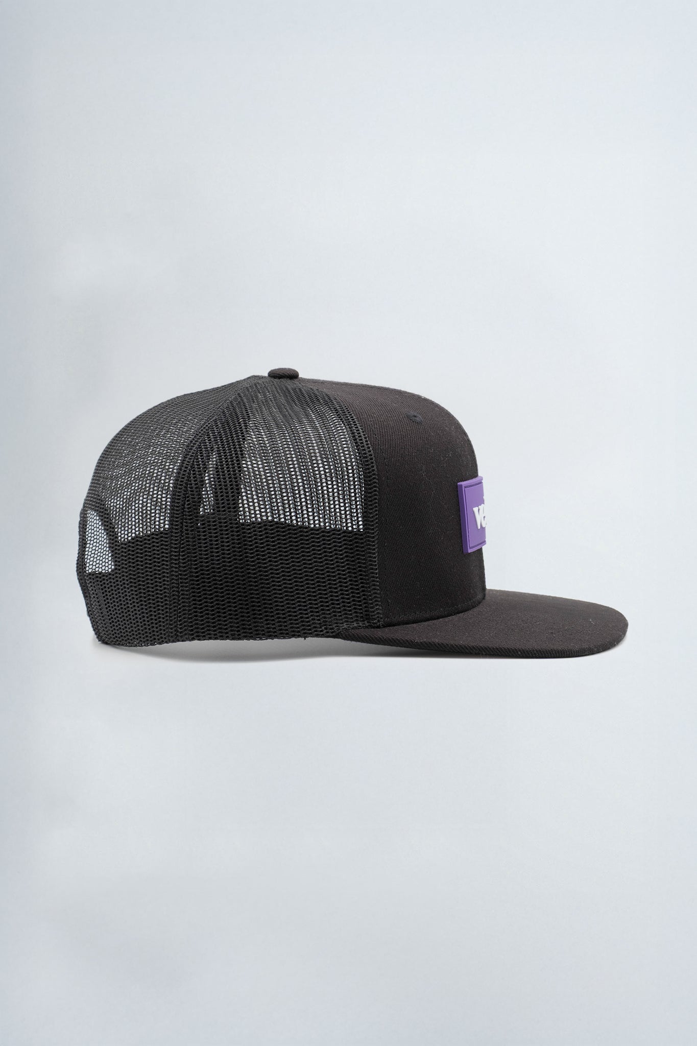 Black mesh cap with a purple logo on a light background