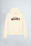 Cream hoodie with 'Velvet' text on a light background