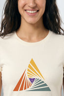 Person wearing a beige t-shirt with a colorful triangle design