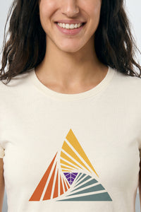 Person wearing a beige t-shirt with a colorful triangle design